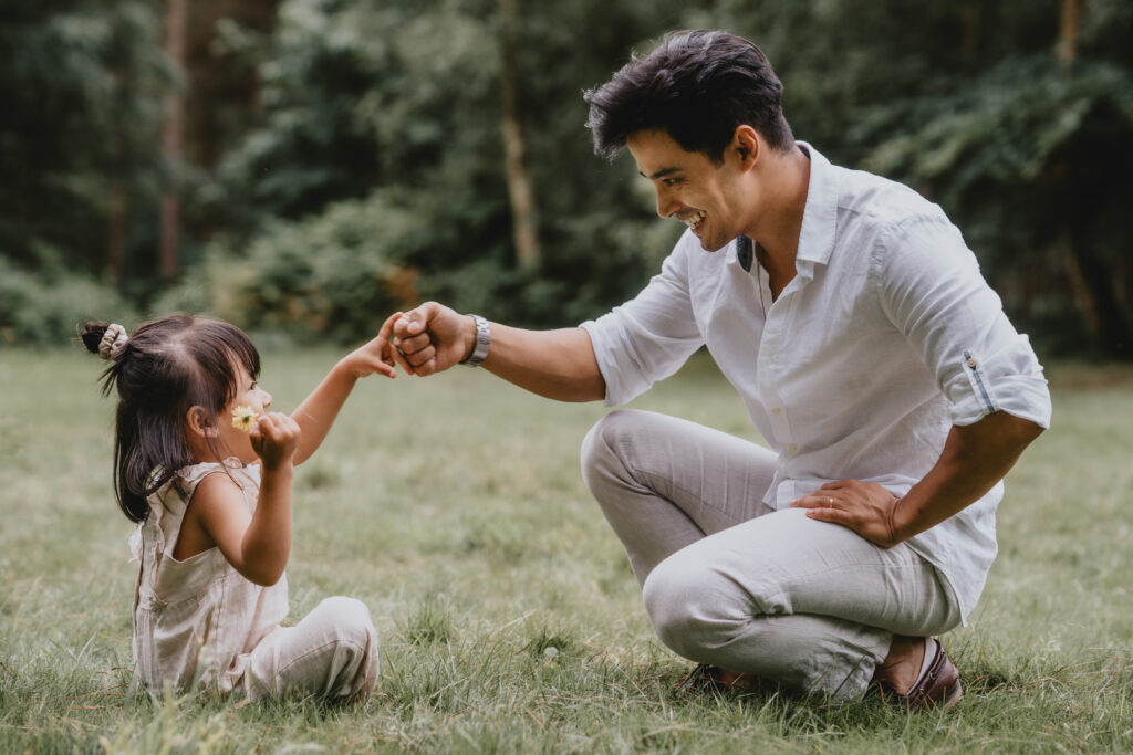 dad playing games with daughter