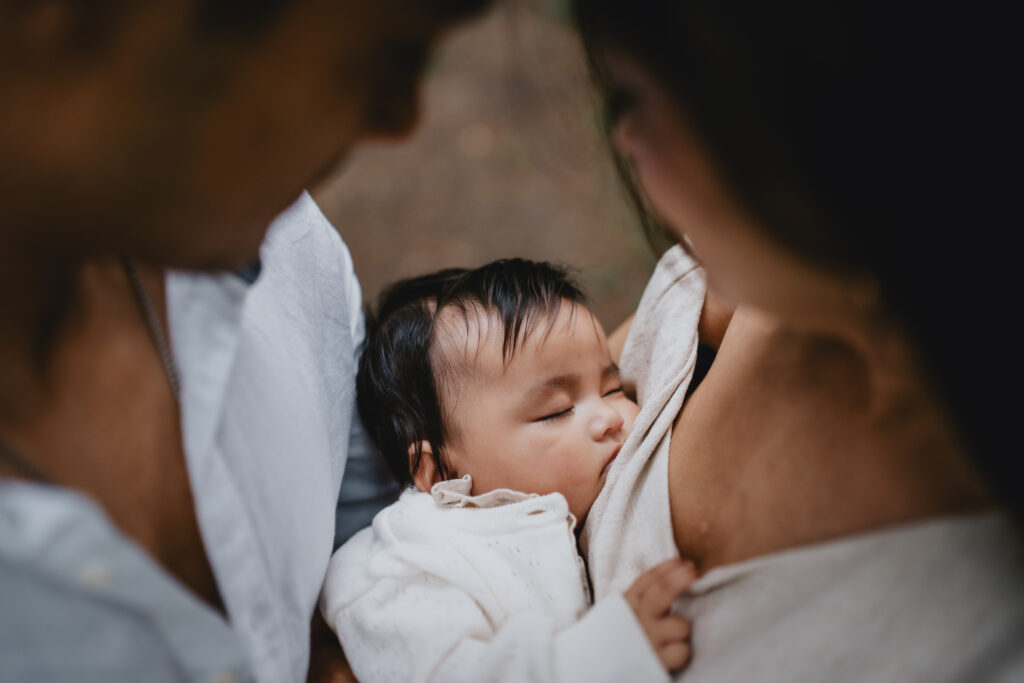 couple holding newborn