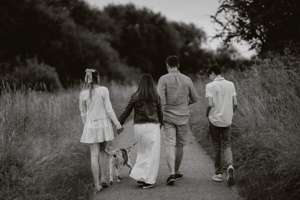 photograph of family walking away