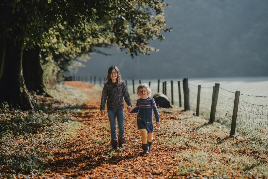 sisters holding hands photograph